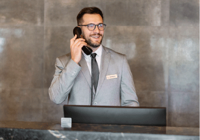 Front desk associate on the phone